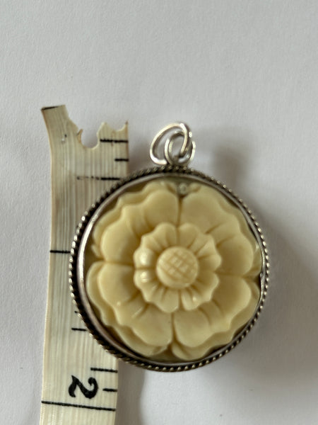 Joan Slifka Carved Rose Pendant with cherub