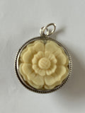 Joan Slifka Carved Rose Pendant with cherub