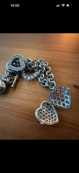 Silver hallmarked heart charm bracelet