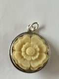 Joan Slifka Carved Rose Pendant with cherub