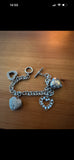 Silver hallmarked heart charm bracelet