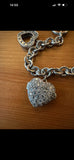 Silver hallmarked heart charm bracelet