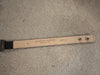 Leather belt with 'Streets Ahead' branding on a textured surface