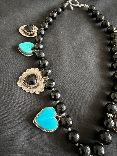 Joan Slifka Black Cross Turquoise Heart charm necklace